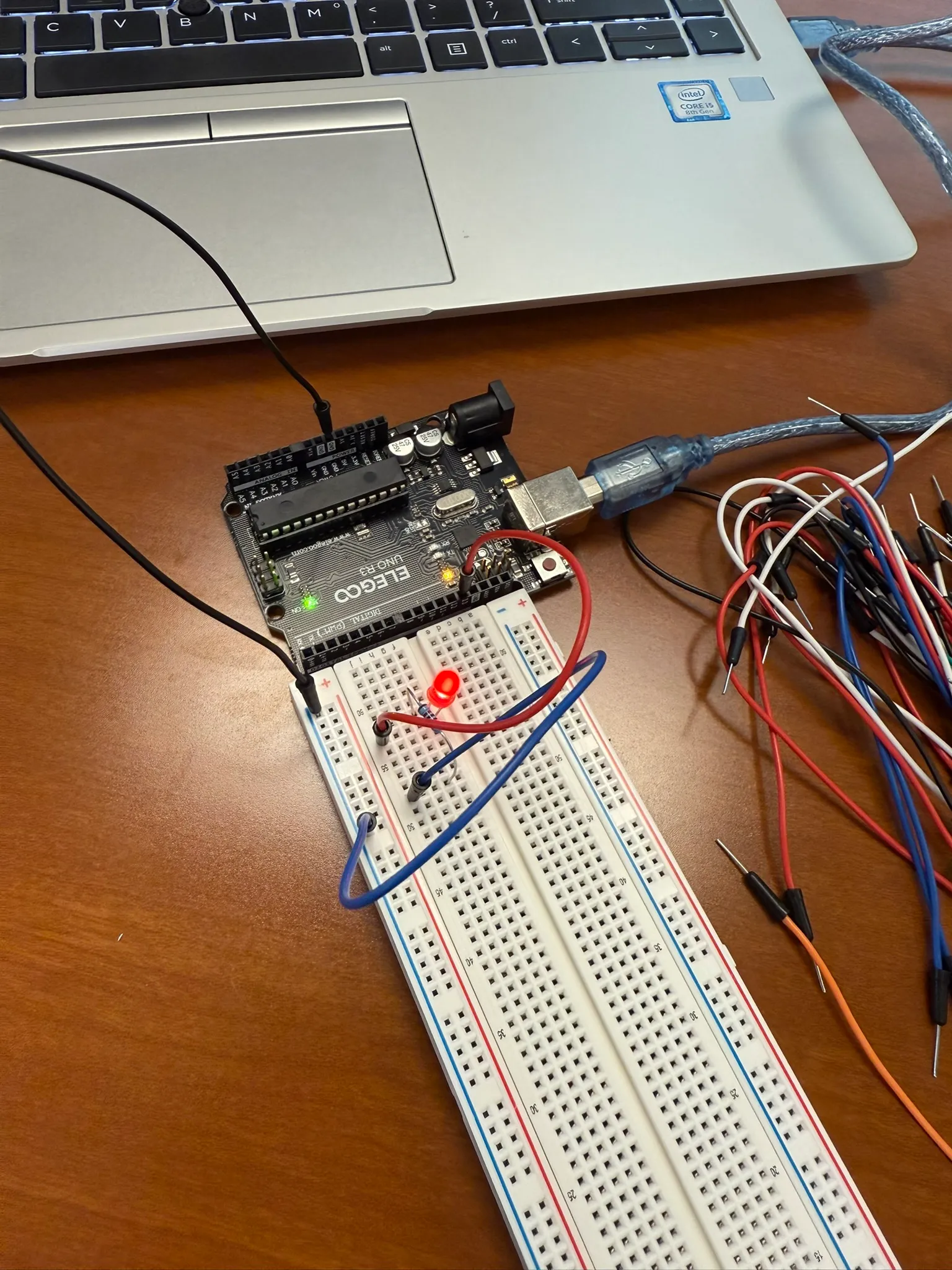 Bench testing the circuit with the Arduino and breadboard